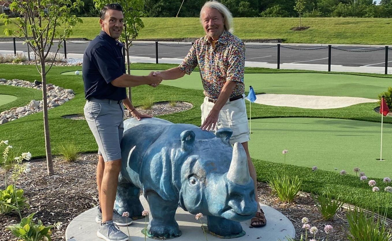 Joe Edwards, right, with Tower Tee co-owner Mike Shamian